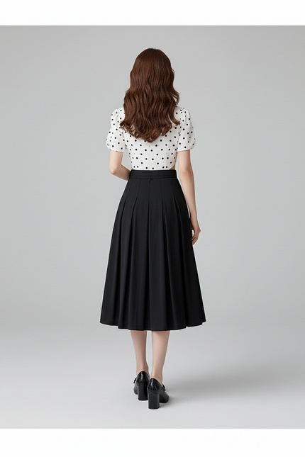 Jupe Plissée noire midi chic